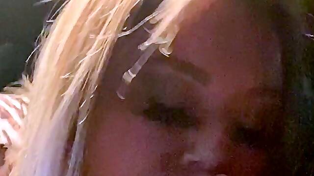 Close up with blonde seductress masturbating pussy
