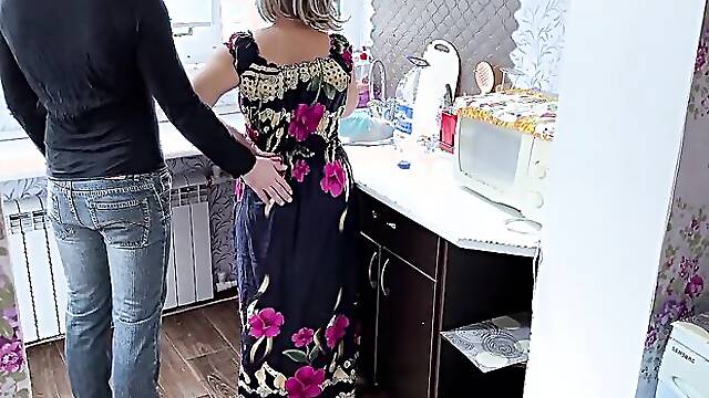 Under the dress of an ordinary housewife hides her mature ass who wants anal sex