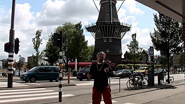 His buddy gives him the cash to pay for a hooker in Amsterdam